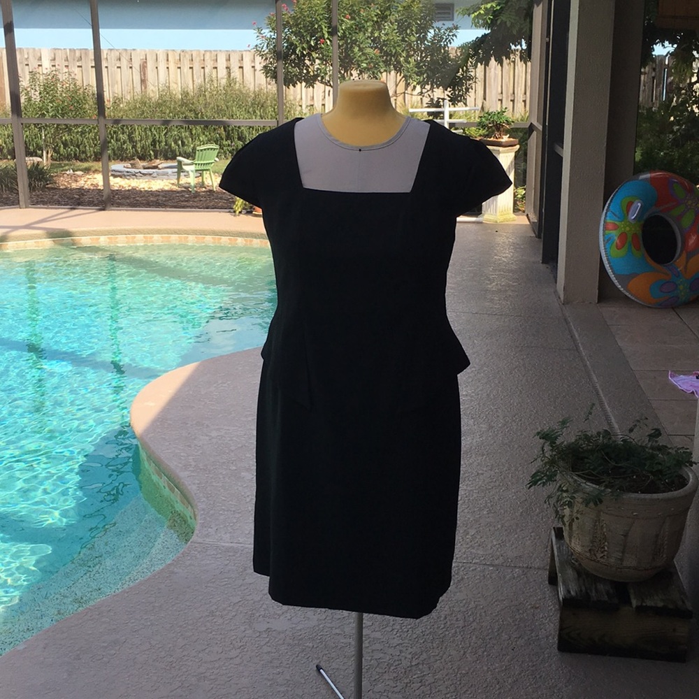 Peplum Square neck dress.